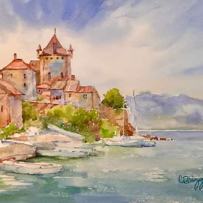 Watercolor painting of a castle by the water with boats and lush greenery.