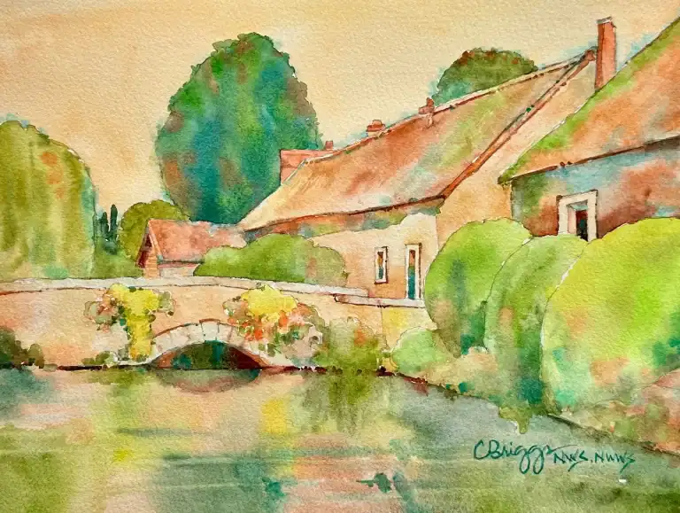 Watercolor painting of a rustic village with a bridge over a river and lush greenery.